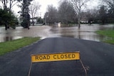 Road cut off and a 'road closed' sign in Benalla, Victoria
