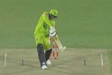 Usman Khawaja plays a shot and appears to edge the ball behind to the wicketkeeper