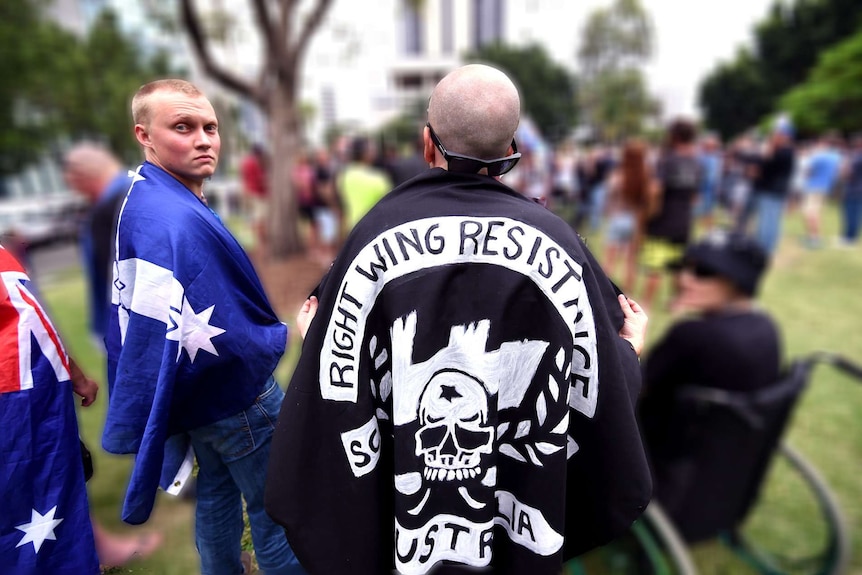 Ethan with southern cross flag draped over shoulder.
