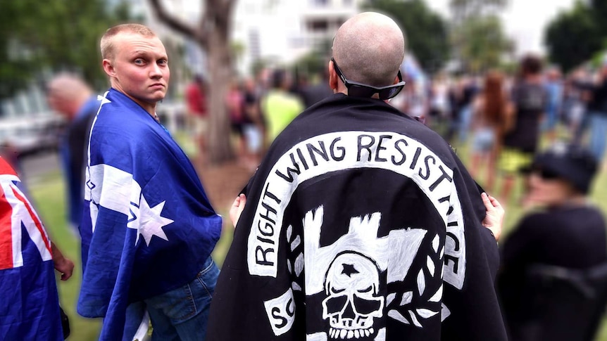 Ethan with southern cross flag draped over shoulder.