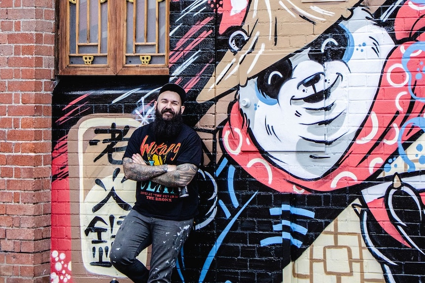 Jeswri with his mural