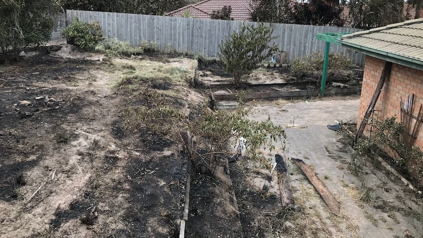 Charred back yard of a house in Carrum Downs.