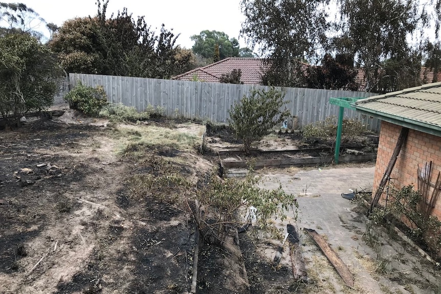 Charred back yard of a house in Carrum Downs.