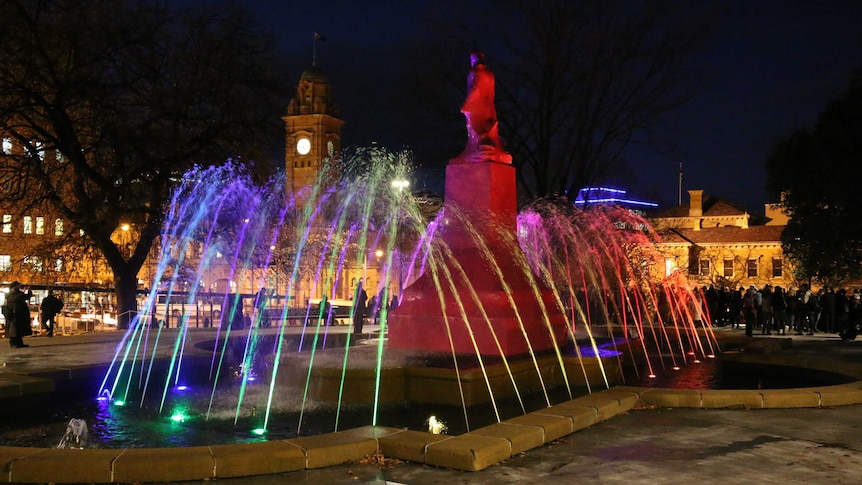 Franklin Square fountain rainbow lit