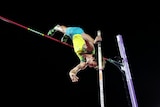 Kurtis Marschall leaps over the bar as shown from below