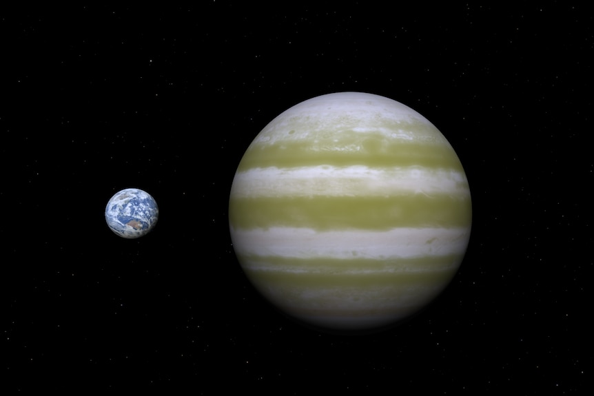 A big circle planet striped white and yellow in black space with a small earth next to it
