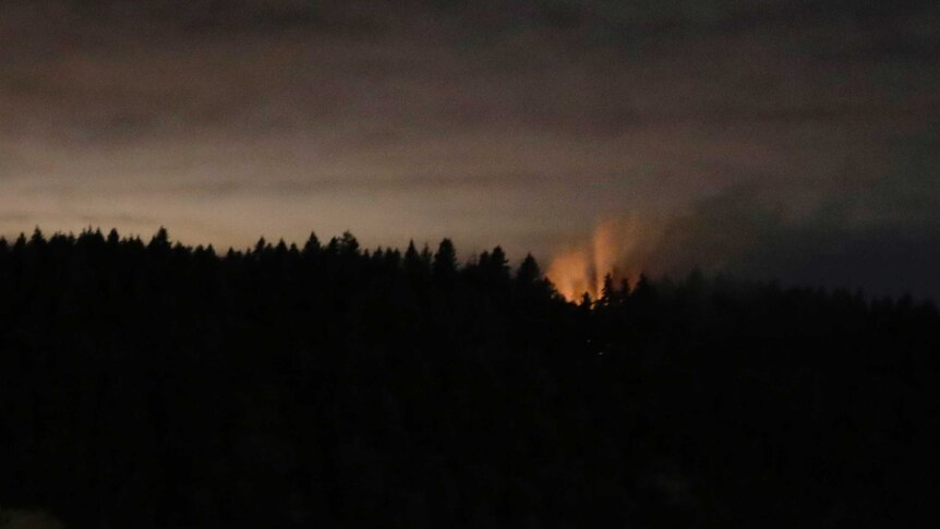 Long exposure of flames from Ketron Island