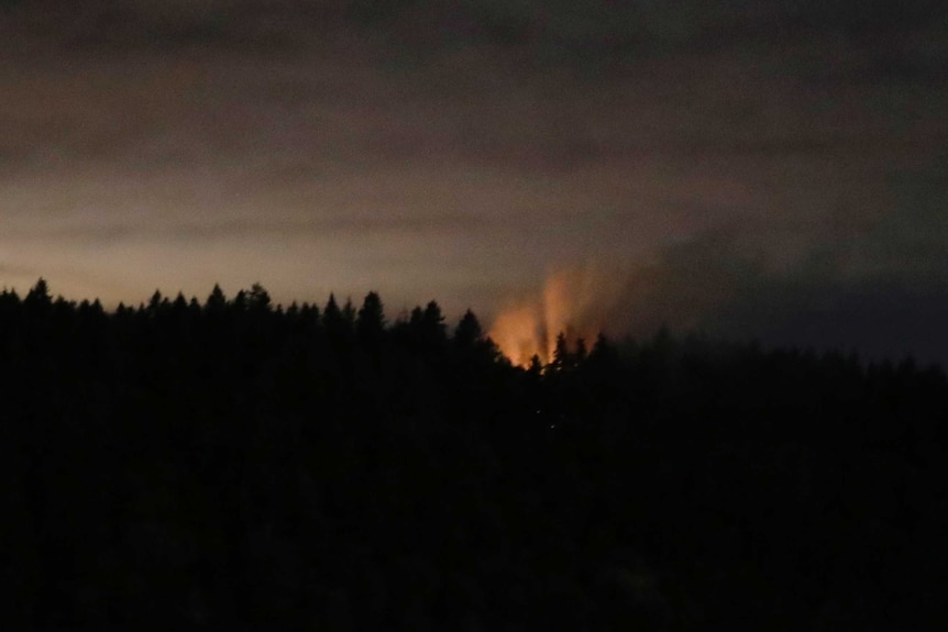 Long exposure of flames from Ketron Island
