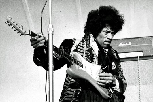 Jimi Hendrix playing guitar
