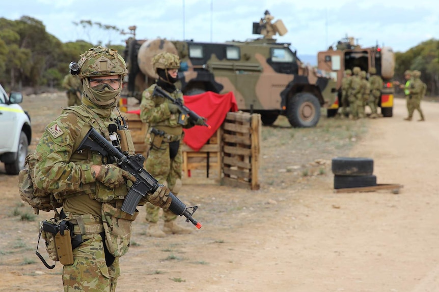 Soldiers from 7RAR undergo a training exercise in Adelaide.