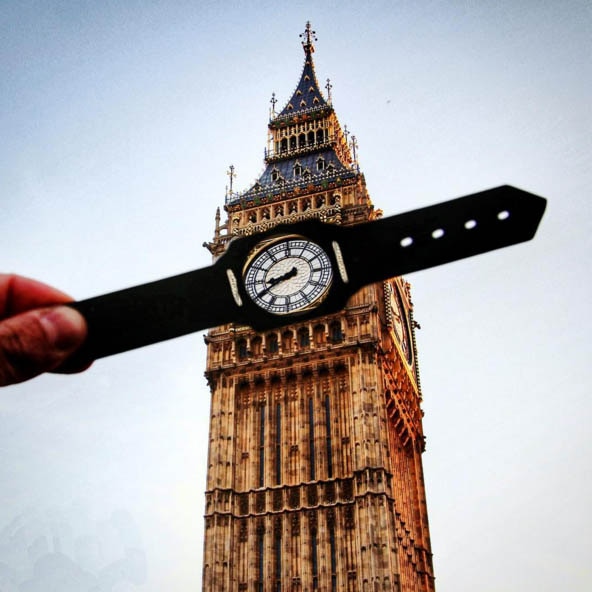 A photo of the Big Ben with a wristwatch cut out