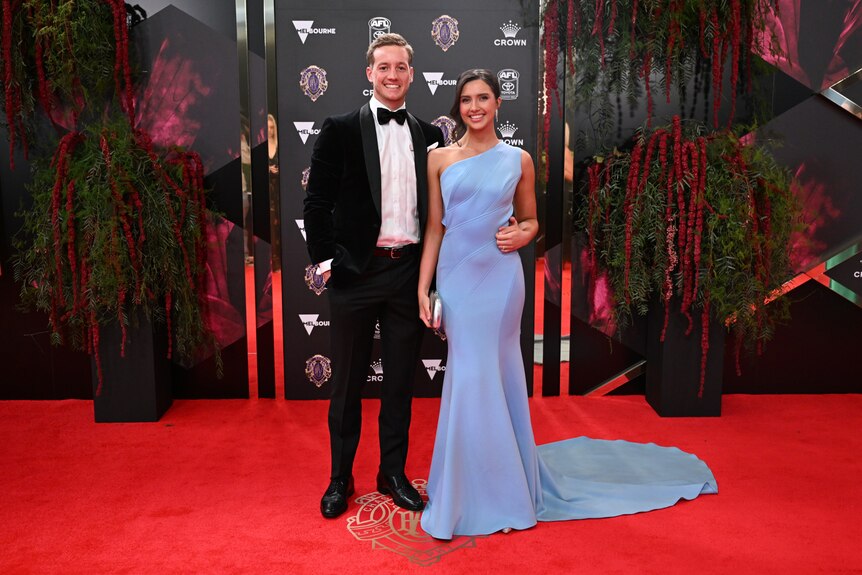 Here's Essendon's Darcy Parish with wife Grace.