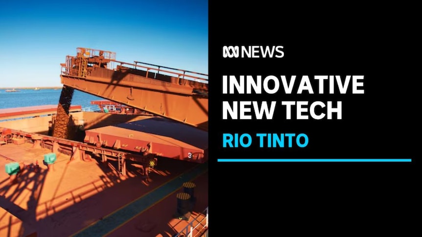 Innovative New Tech, Rio Tinto: Iron ore pours from a machine into a hole in the deck of a ship.