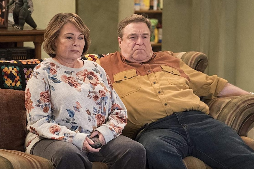 A scene from the Roseanne reboot shows Roseanne Barr and John Goodman