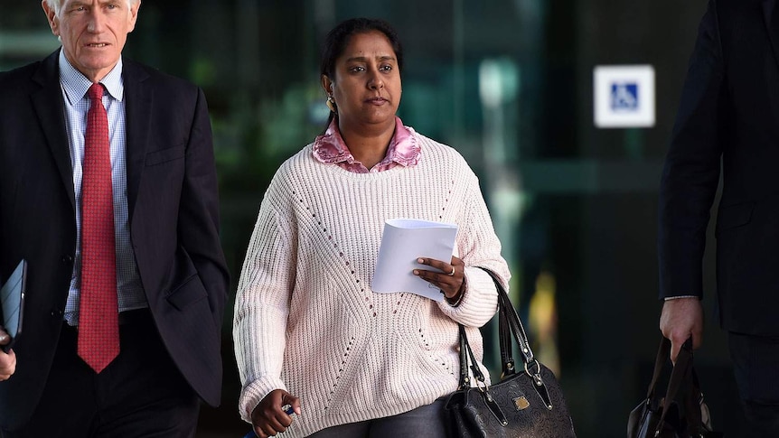 Divya Krishne Gowda leaves Brisbane Magistrates Court on May 11, 2015
