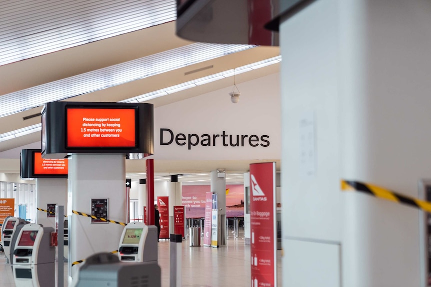 An empty airport departure lounge