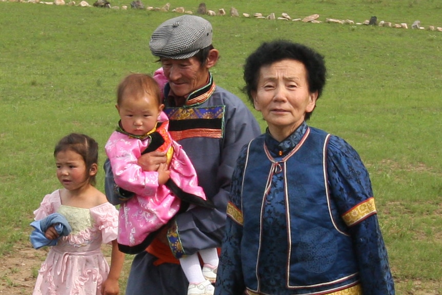 Mongolian mother Sevjid Damdin with her husband Vaani and two grandchildren