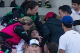 Boy in crowd tended to after being struck by ball at WBBL