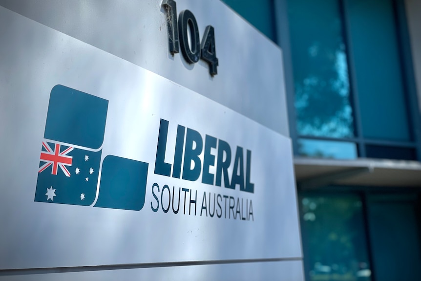 A sign reading Liberal South Australia in front of a building
