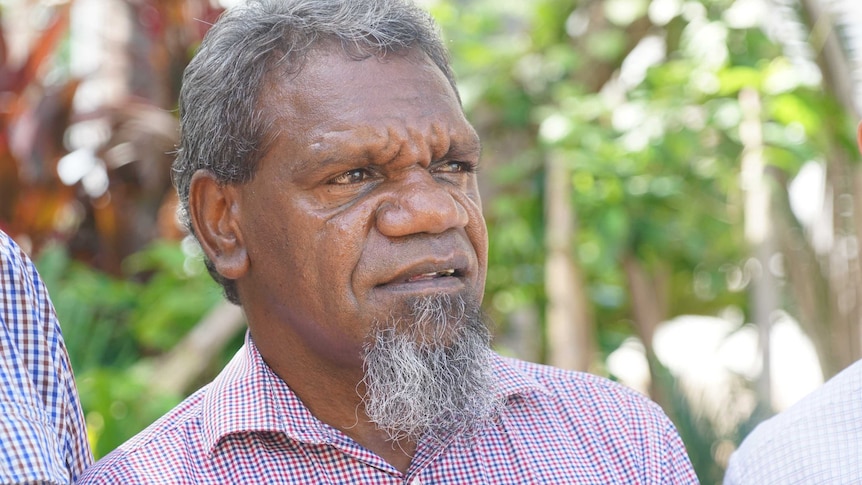 Traditional owner Benedict Stevens, an Aboriginal man, looks into the distance.