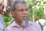 Traditional owner Benedict Stevens, an Aboriginal man, looks into the distance.