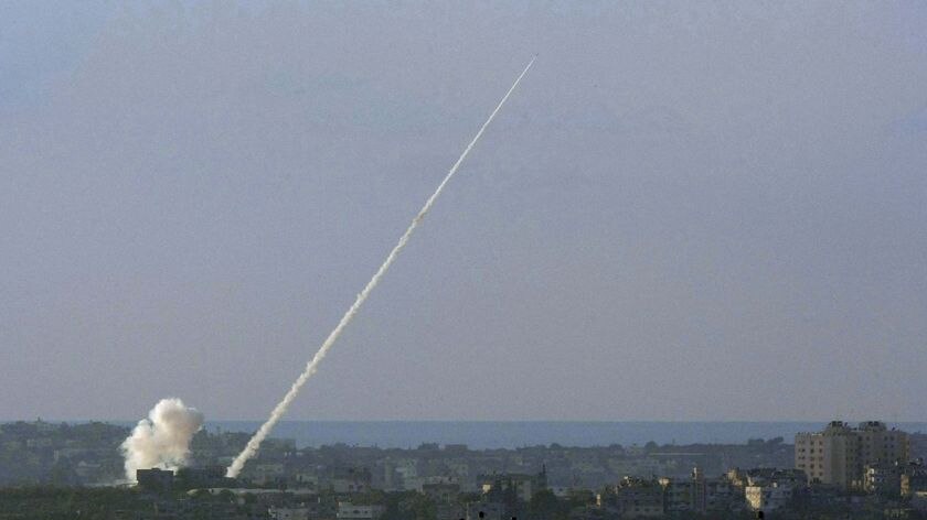 A rocket is fired from from the Israeli-Gaza border into Israel