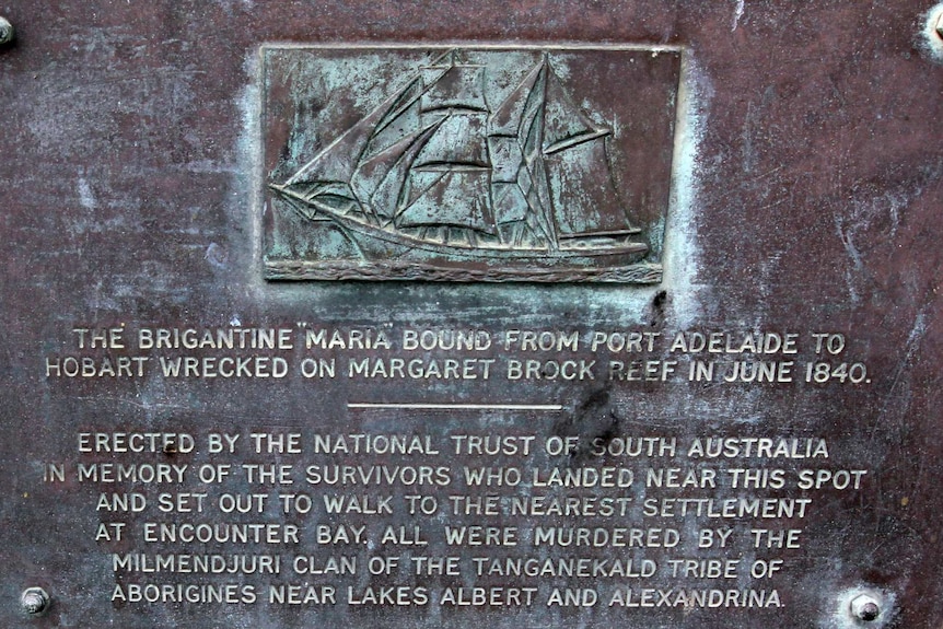 A plaque about the Maria massacre