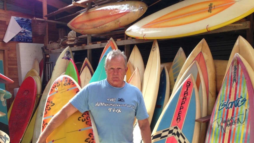 Phil Critchlow with part of his surf board collection