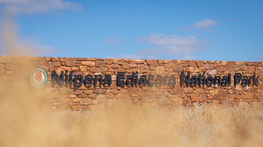 A sign marking the Nilpena Ediacara National Park.