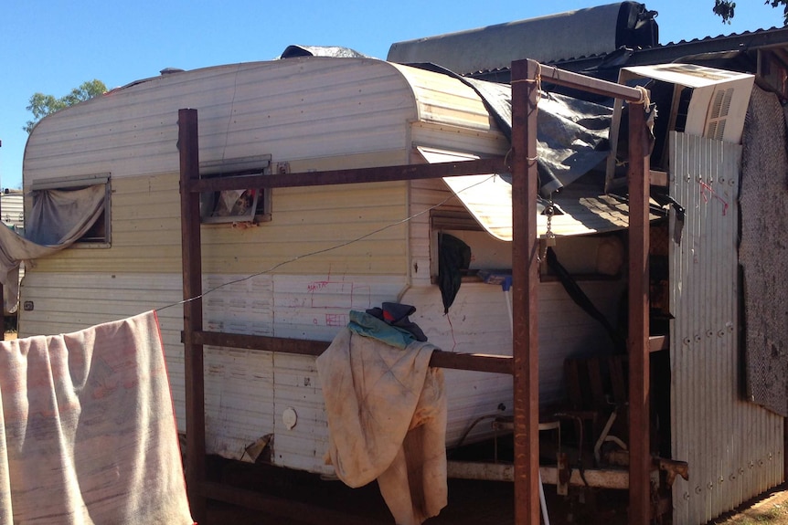 A caravan and lean-to in Borroloola