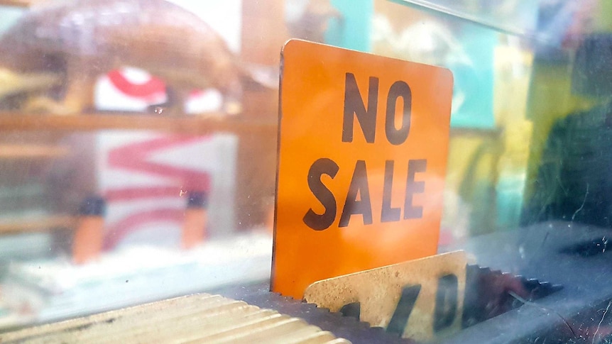 No sale sign on an antique cash register.