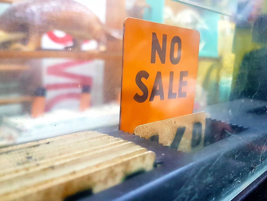 No sale sign on an antique cash register.