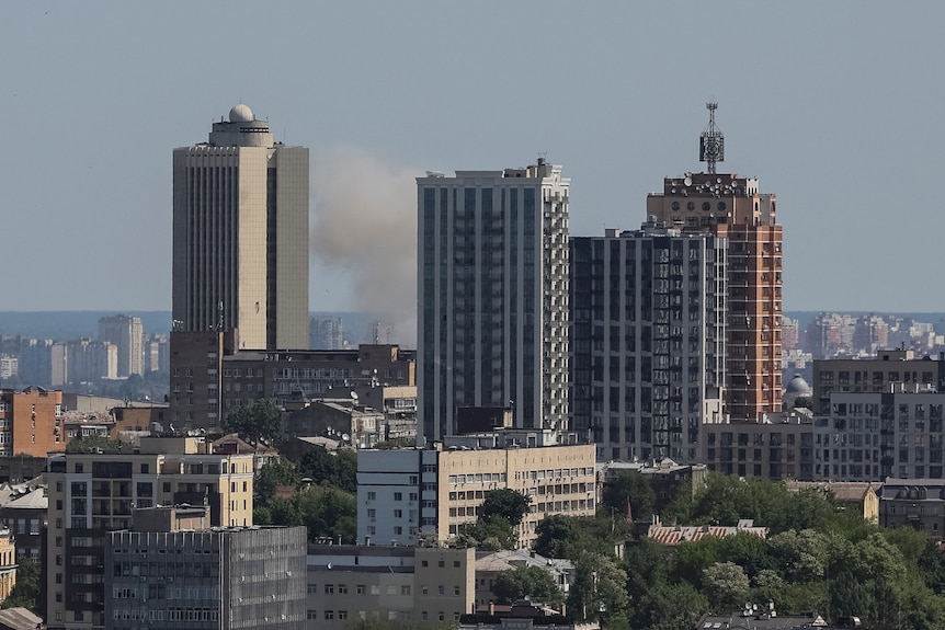 Smoke rises in the sky over the city after a Russian missile strike, amid Russia's attack on Ukraine, in Kyiv.