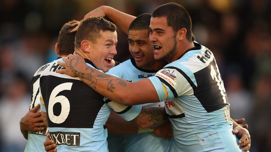 Todd Carney and Sharks team-mates celebrate