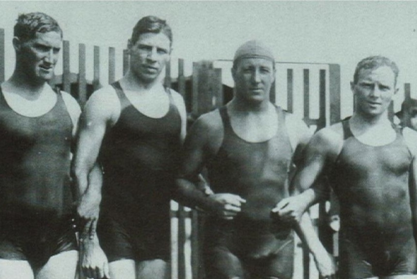 The winning Australian 4x200 metre relay team pose poolside at the 1912 Stockholm Olympics