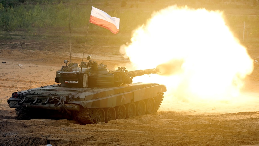 A Polish Army PT-91 tank fires during NATO exercises.