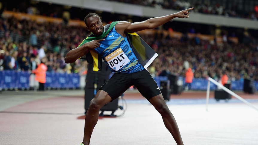 Impressive victory ... Usain Bolt celebrates winning the men's 100 metres final in London