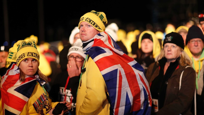 People in Aussie gear at Anzac Cove for dawn service