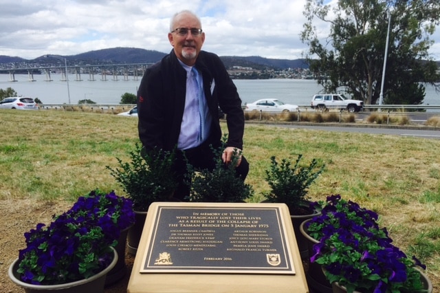 Peter Rezek inspects the new plaques dedicated to the Tasman Bridge disaster victims