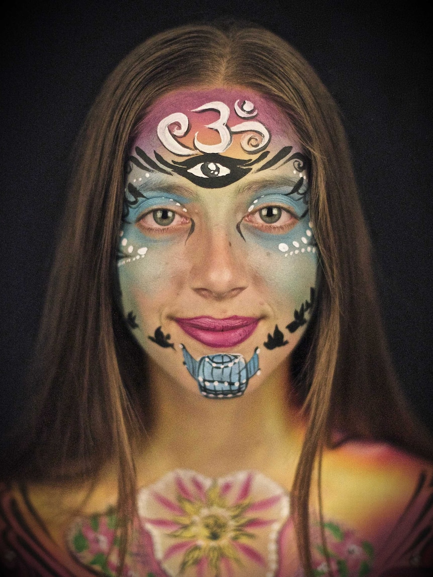 Jade's face-painted portrait.