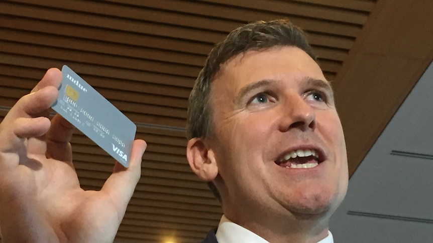 Social Services Assistant Minister Alan Tudge with new welfare card