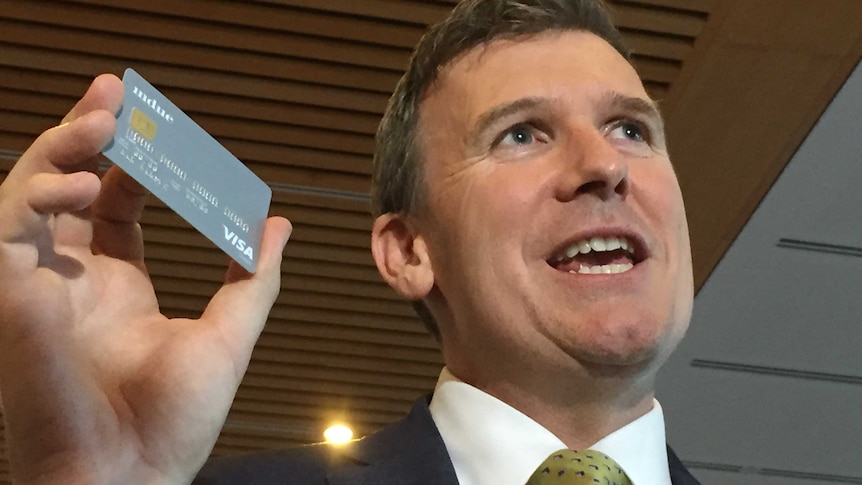 Social Services Assistant Minister Alan Tudge with new welfare card