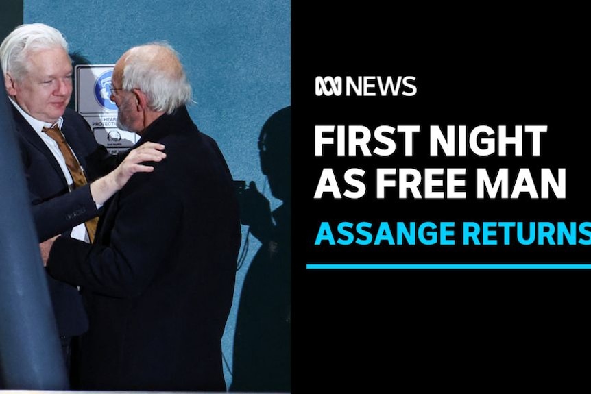 First Night as Free Man, Assange Returns: Julian Assange embracing his father John Shipton.