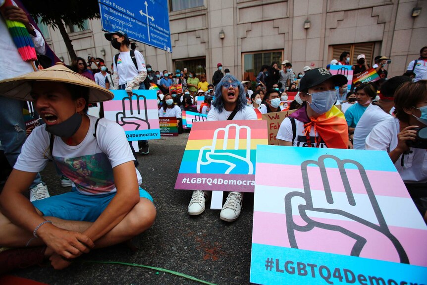 Anti-coup protesters from the LGBTQ community attend a rally