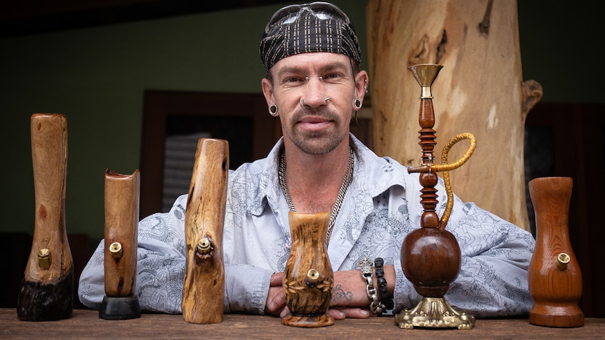 Paul Pearson with some of the wooden bongs he has made