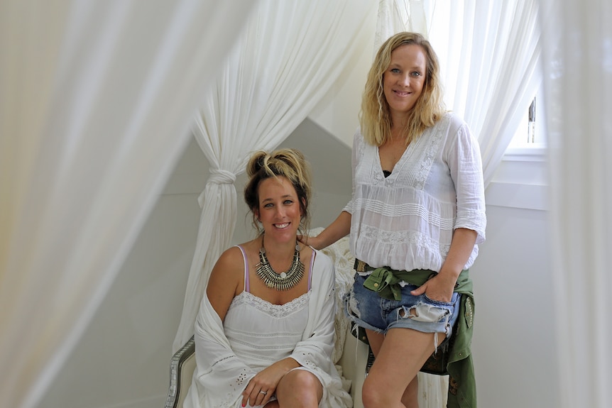 Isabella Pennefather (seated) and Elizabeth Abegg in the bridal area of their boutique