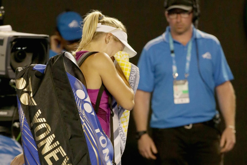 Daria Gavrilova cries as she leaves the Australian Open