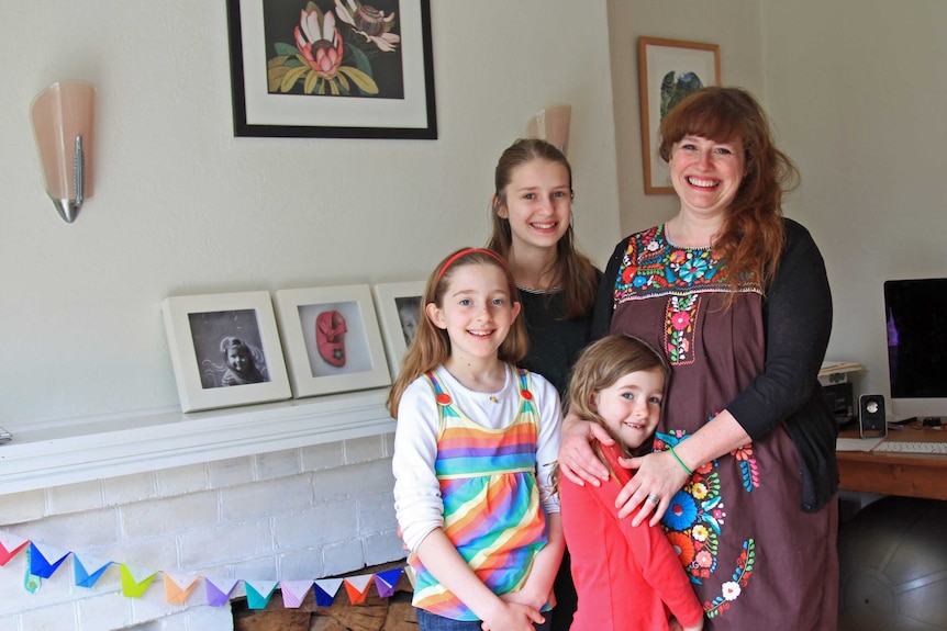 Lauren Carter with children by their advent calendar