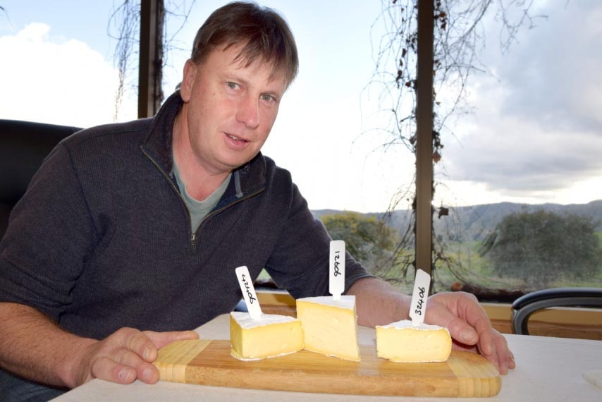 Tarago River Cheese director David Johnson with three soft cheeses