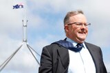 Anthony Albanese outside Parliament House in the wind